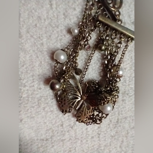 Butterfly 🦋 bow multi chain toggle bracelet - Picture 2 of 5